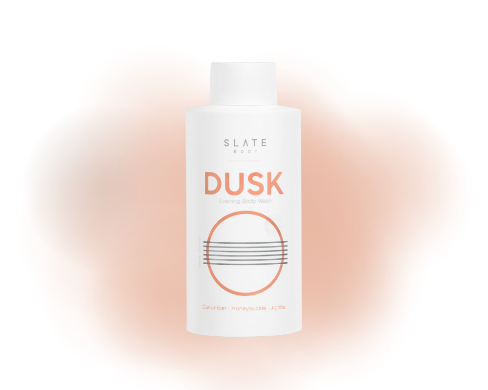 Bottle of Slate Body Dusk - evening body wash product on a gradient background