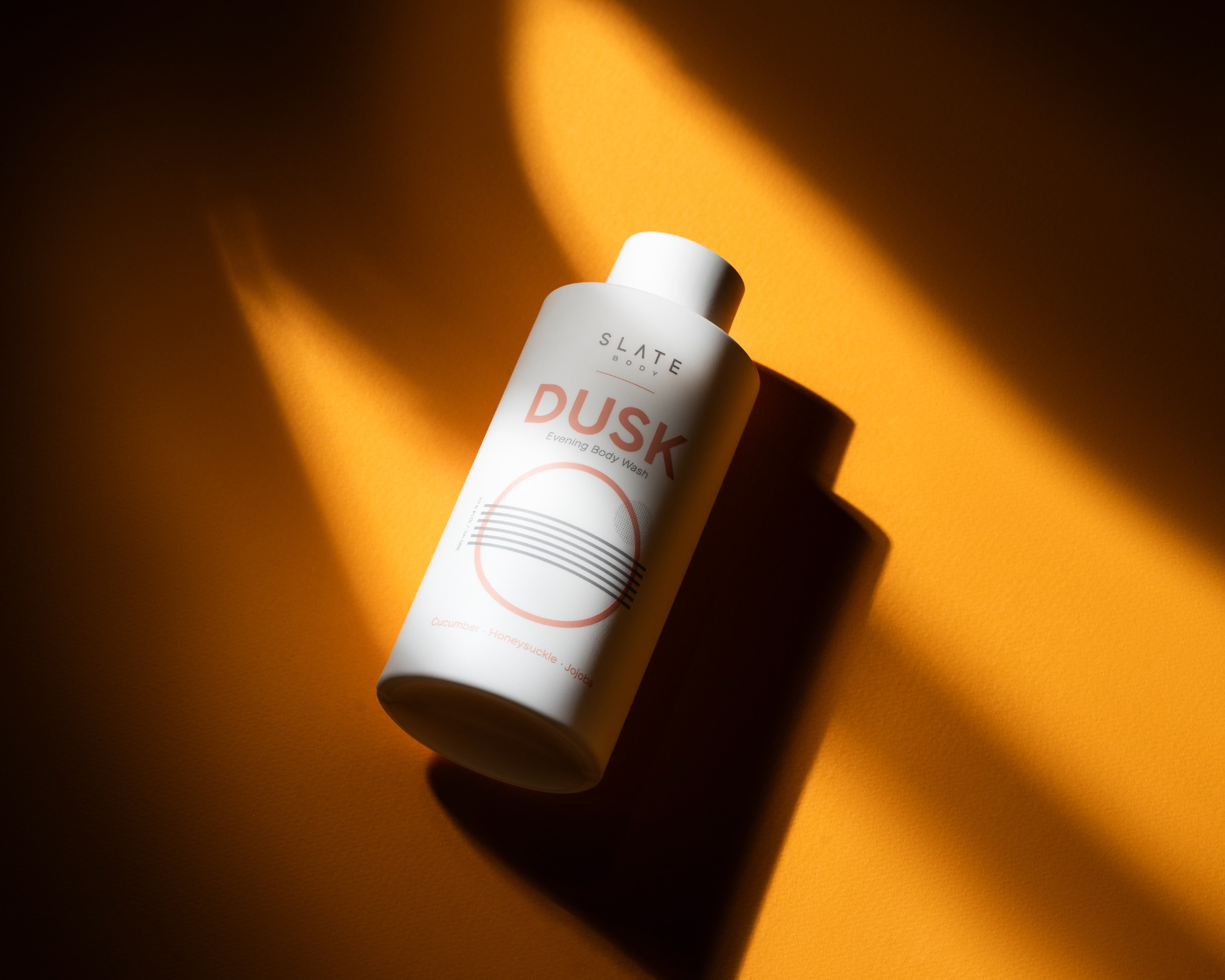 SLATE Body made Evening Shower Gel with a dusk light on it