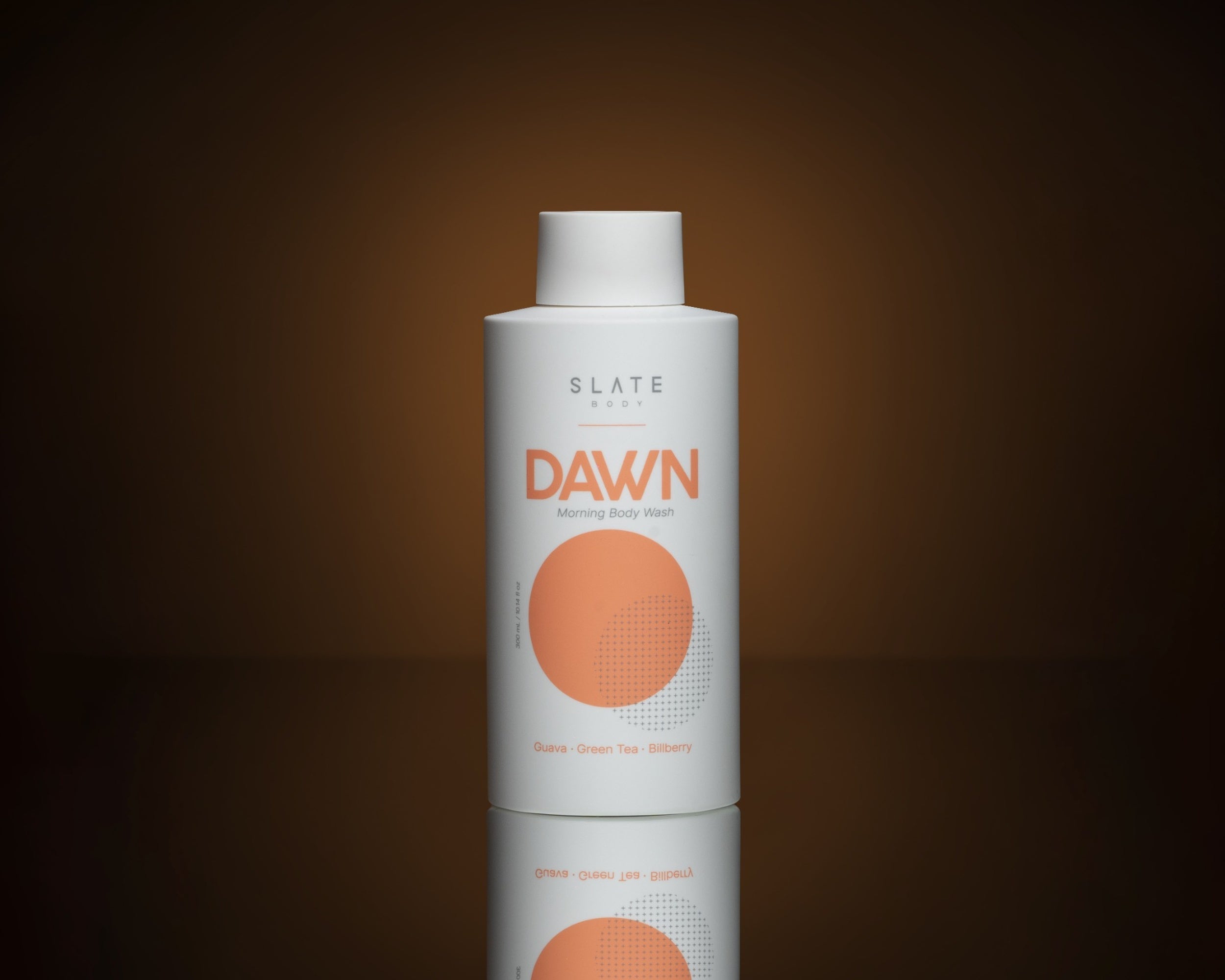 Hero image of DAWN by SLATE Body — a zesty, invigorating morning body wash designed to energize your day. With notes of guava, green tea, and bilberry, this sulfate-free formula is perfect for crisp, fresh starts.